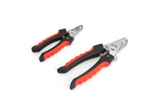 Two pairs of garden pruners with red and black handles on a red background